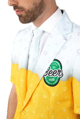 A man wears the Suitmeister Premium Beer Yellow suit, designed with yellow and white sections and printed bubbles. The jacket features a Beer Premium Quality patch. Only the lower half of his face is visible.