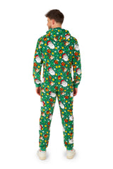 A person faces away, wearing the Suitmeister Santa Elves Green - Christmas onesie with festive holiday patterns like snowmen, presents, and snowflakes, paired with white shoes.