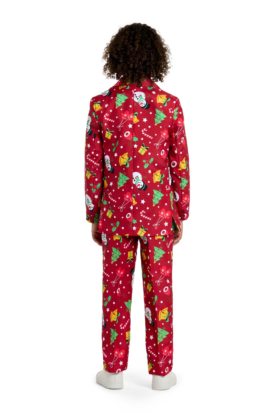 A boy with curly hair, seen from behind, wears the Suitmeister BOYS Christmas Red Icons - Light Up suit featuring festive patterns and stands against a white background.