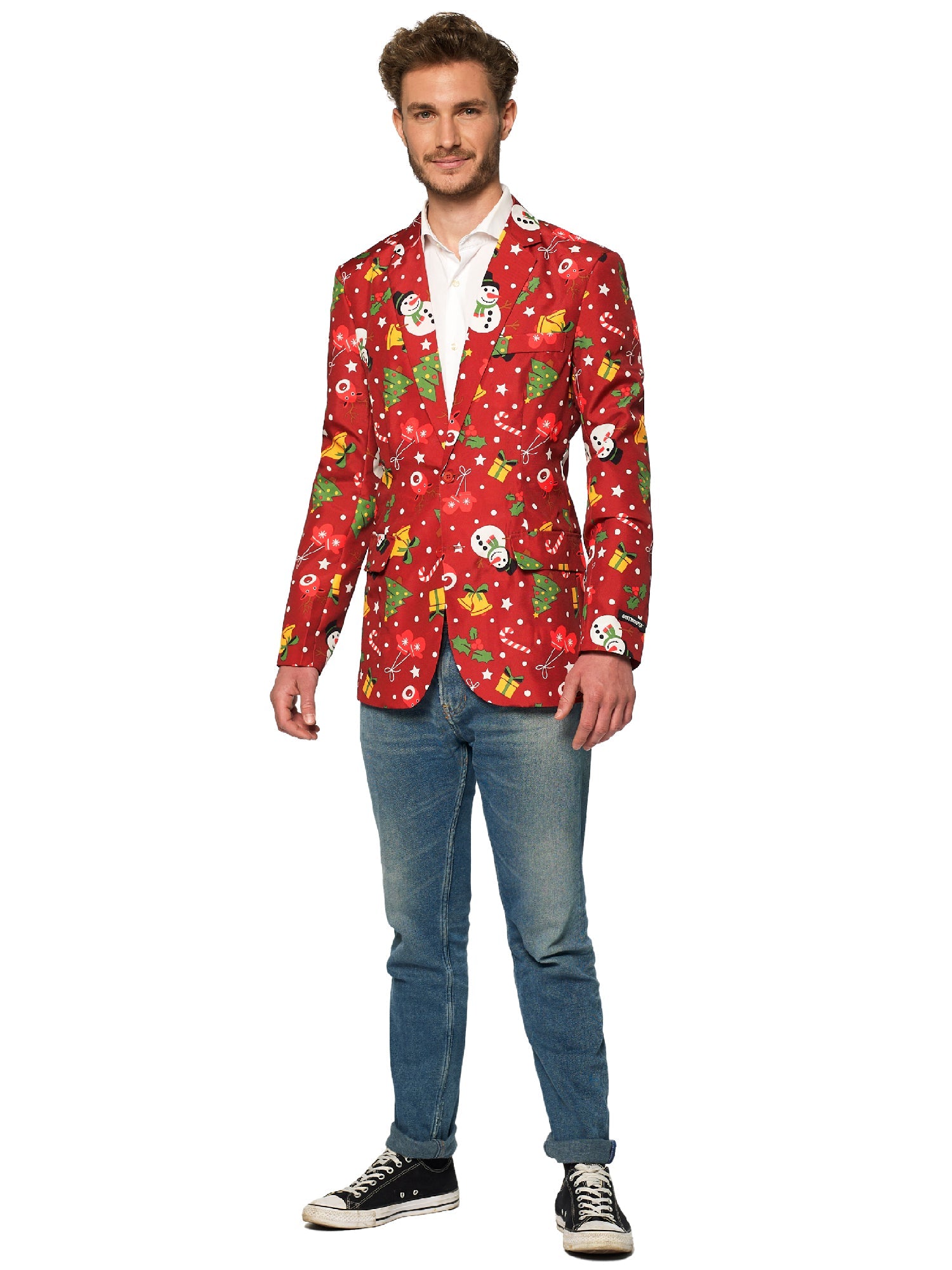 A man smiles in a Suitmeister Christmas Red Icons - Light Up blazer, paired with a white shirt, blue jeans, and black-and-white sneakers against a plain white background.