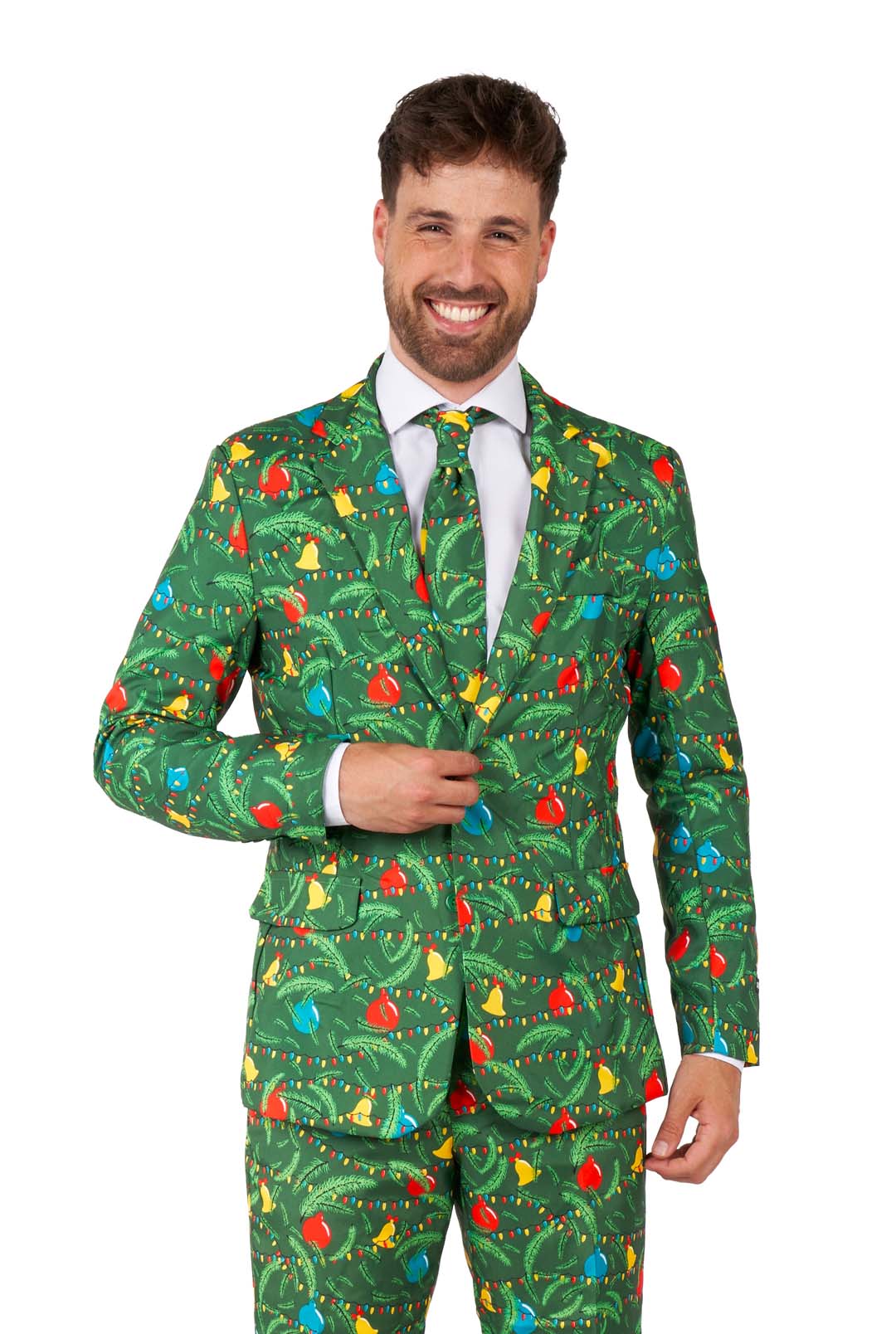 A man in the Suitmeister "Christmas Green Tree - Light Up" suit, featuring colorful ornaments and string lights pattern, with a white shirt and festive tie, stands against a white background.