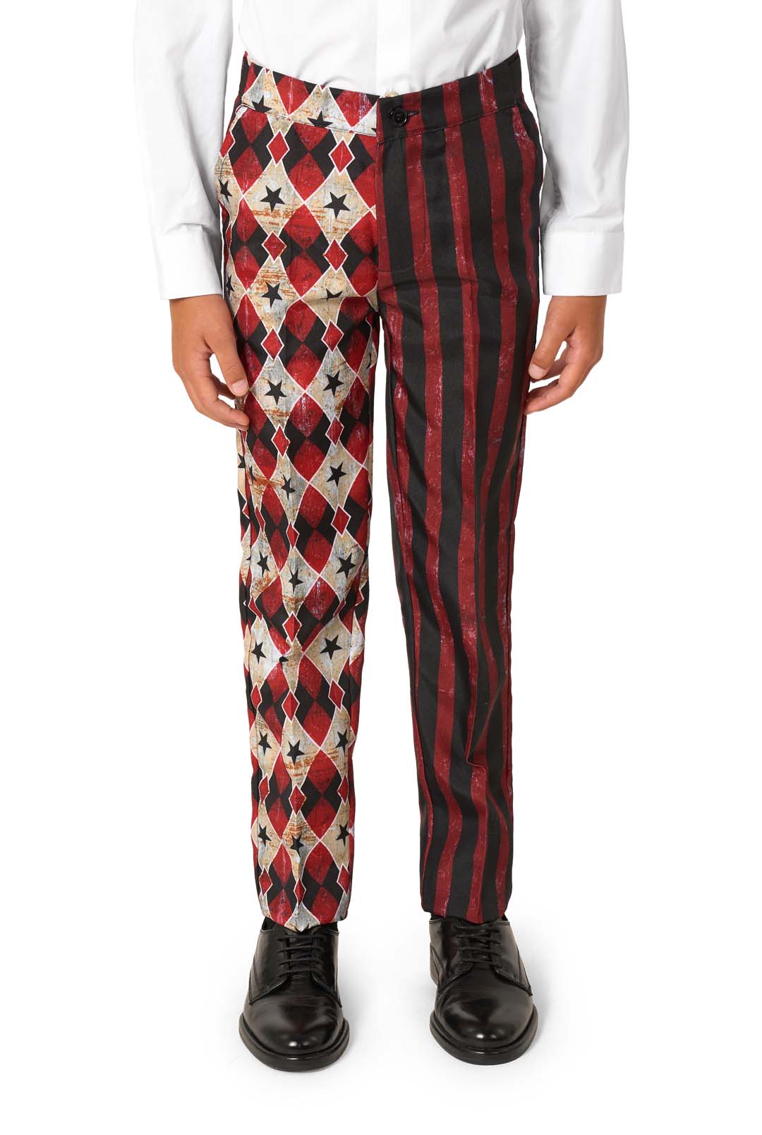 A person wears the Suitmeister Scary Clown Red pants with one leg in red, black, and white diamond-star patterns, the other in red and black stripes, paired with a white shirt and black shoes.