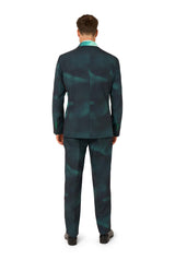 A man faces away from the camera, wearing the Suitmeister IT™ Halloween suit—dark teal with matching pants—and black dress shoes against a white background.