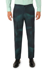 A person wearing the Suitmeister IT™ Halloween suit stands with arms relaxed at their sides against a white background. The outfit features a mint green button-up shirt, dark teal patterned dress pants, and black dress shoes.